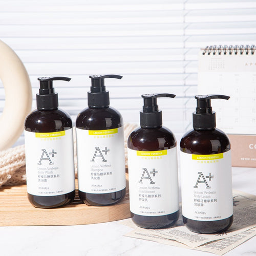 four bottles of AGRARIA hotel toiletries.