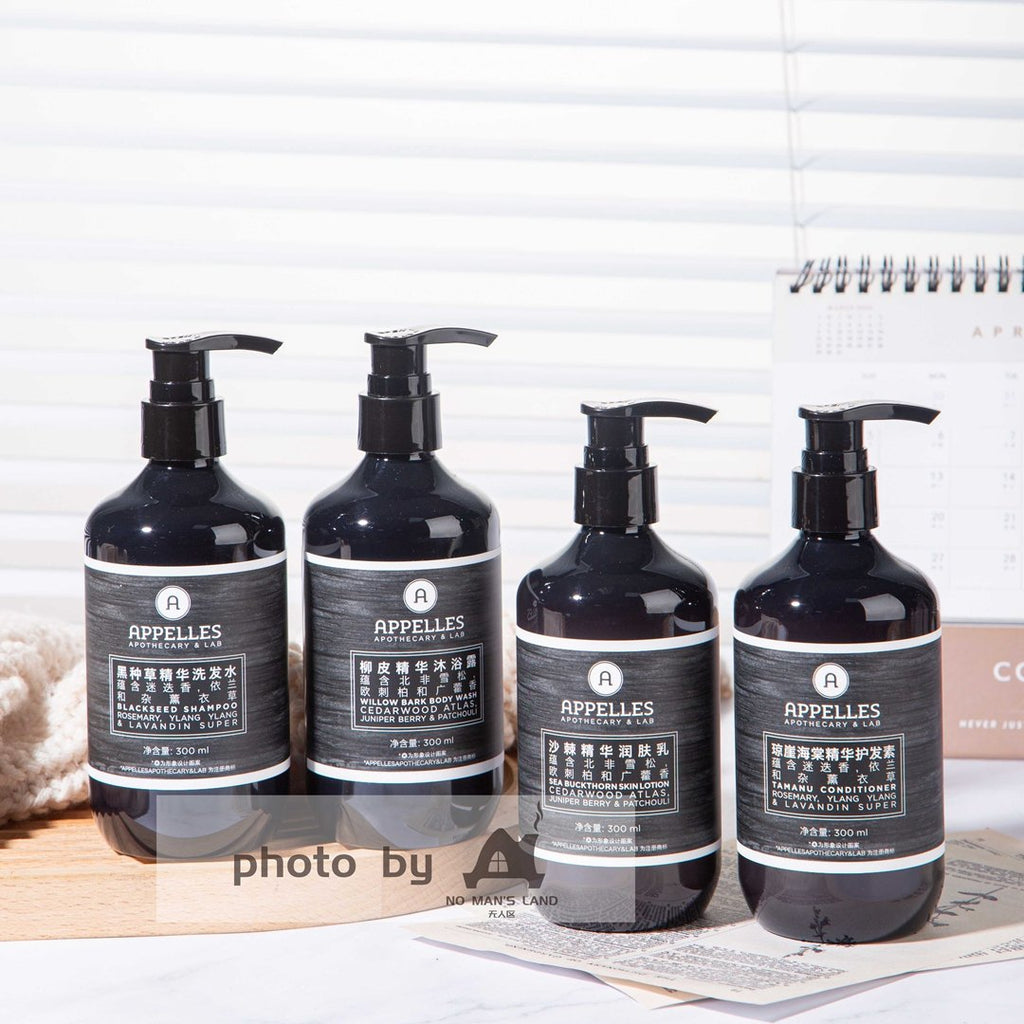 4 bottles of APPELLES Nigella Sativa toiletries displayed on the tray.