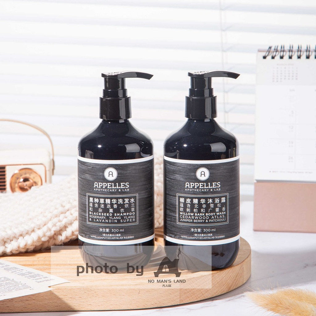 two bottles of APPELLES Nigella Sativa shampoo and shower gel.