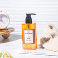 two bottles of BEN SHERMAN hotel shower gel.
